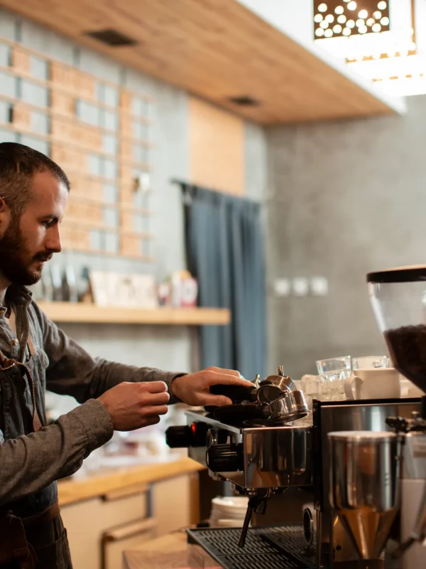 side-view-man-working-coffee-shop